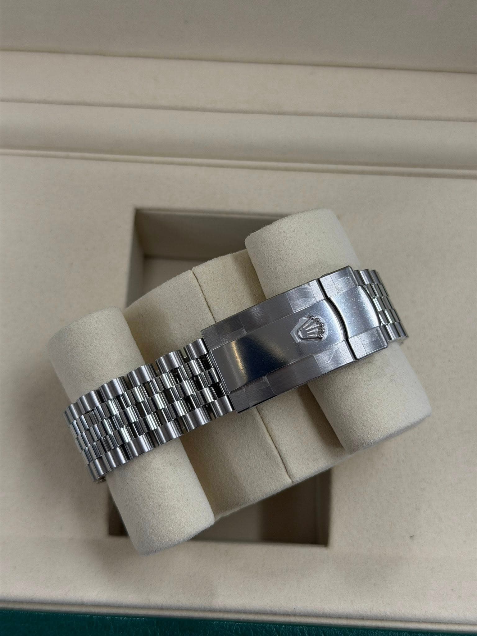 May be an image of wrist watch and jewelry