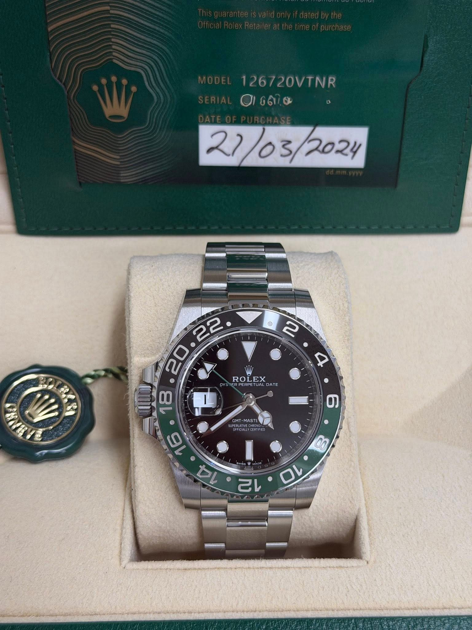 May be an image of wrist watch and text that says '1267 126720VTNR OIGeO 27/03/2024 ® ROLEX oи '