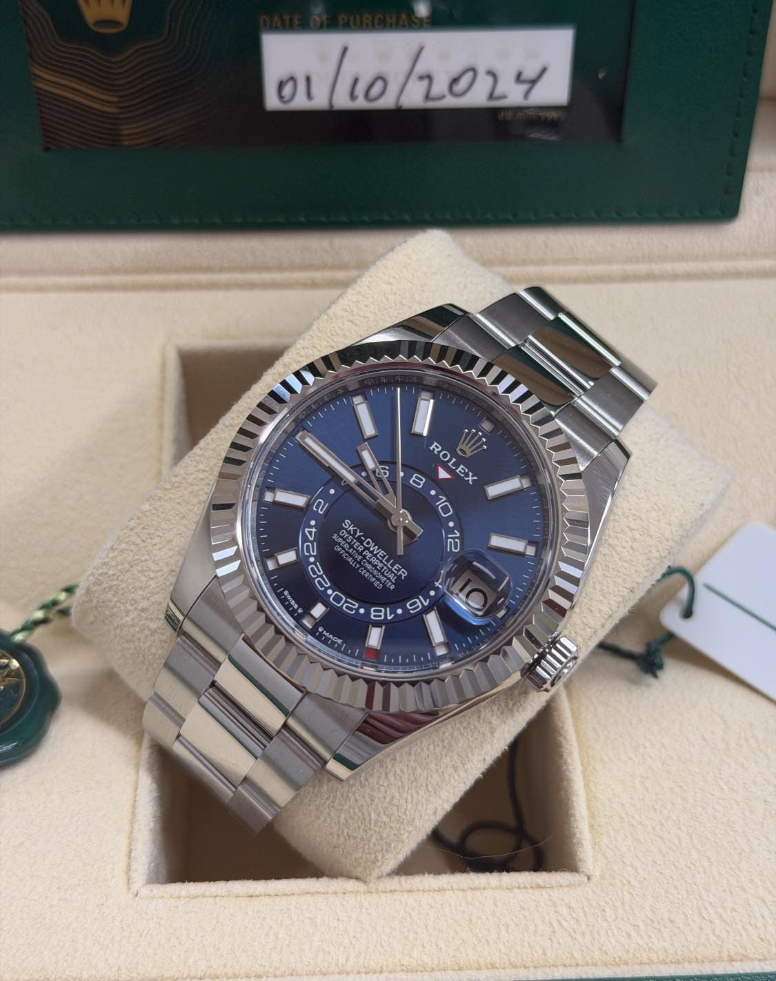 May be an image of wrist watch and text