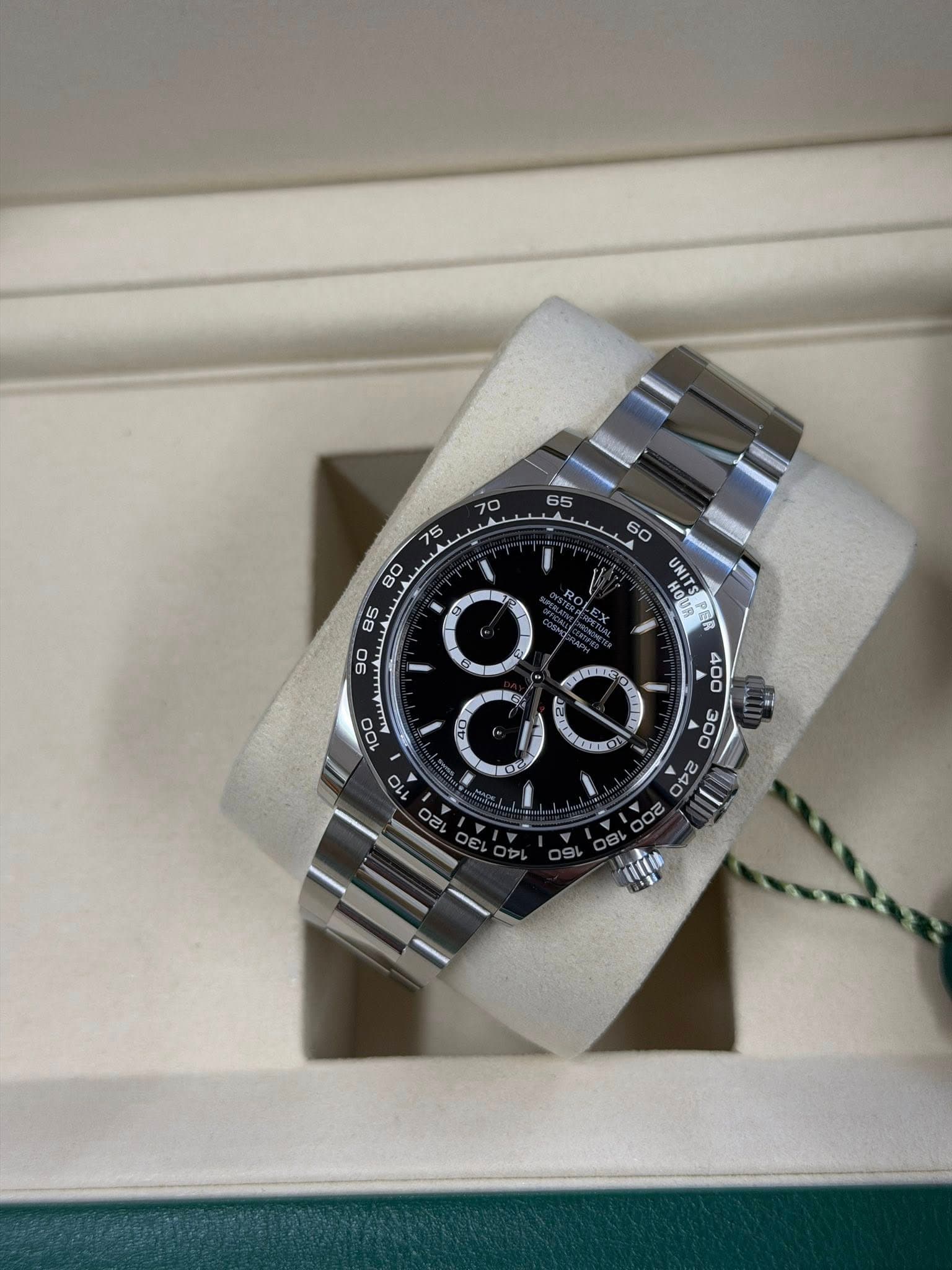 May be an image of wrist watch and text