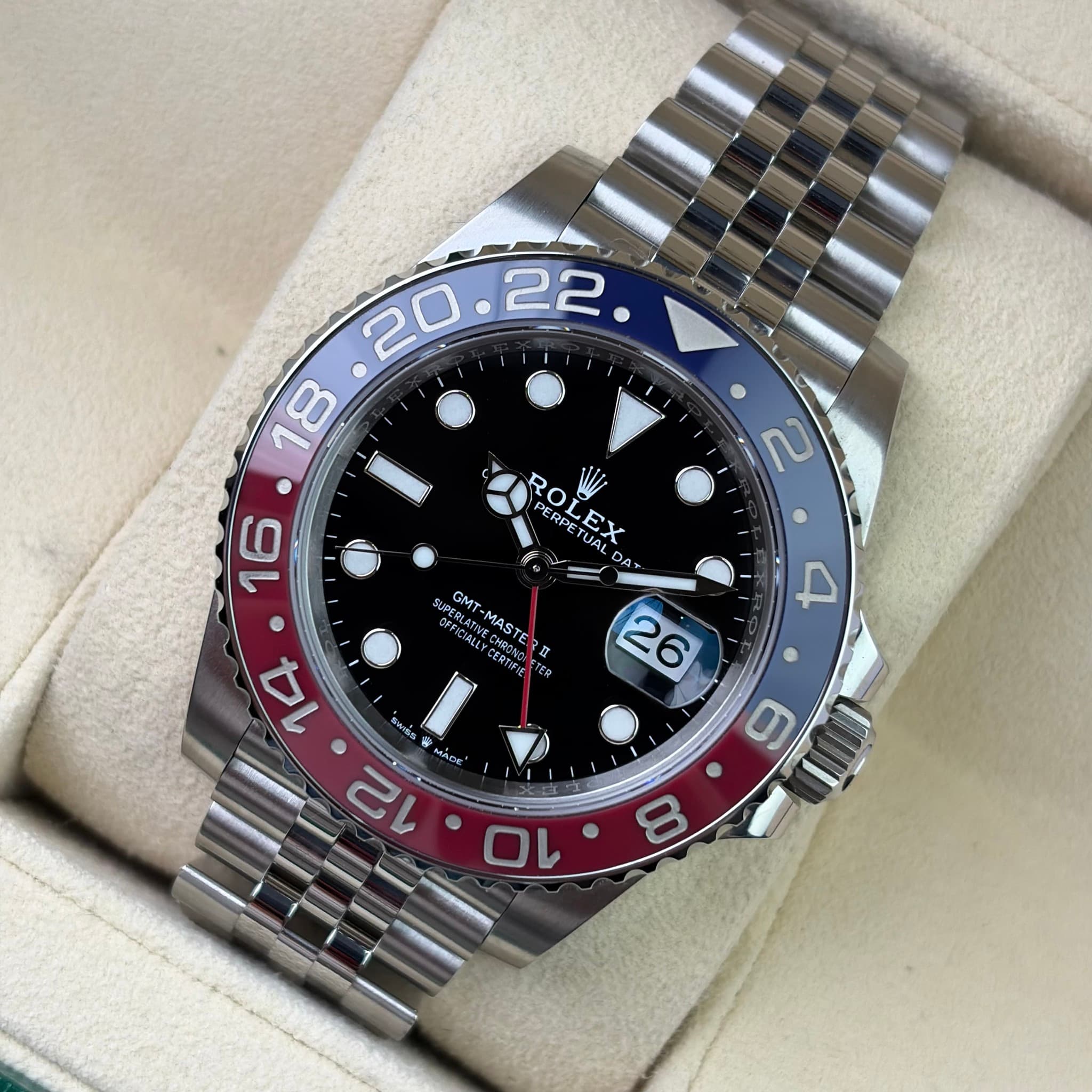 May be an image of wrist watch and text