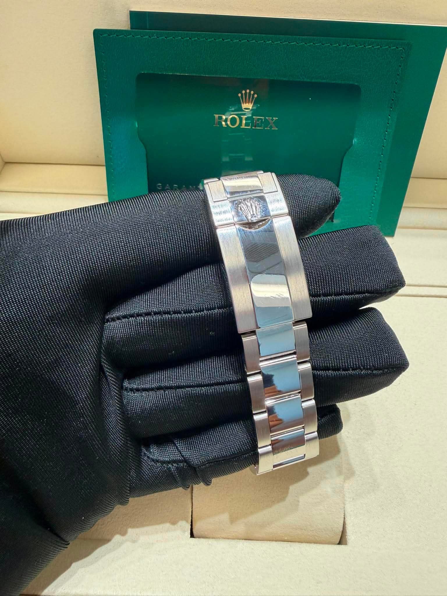 May be an image of leather, jewelry, wrist watch and text
