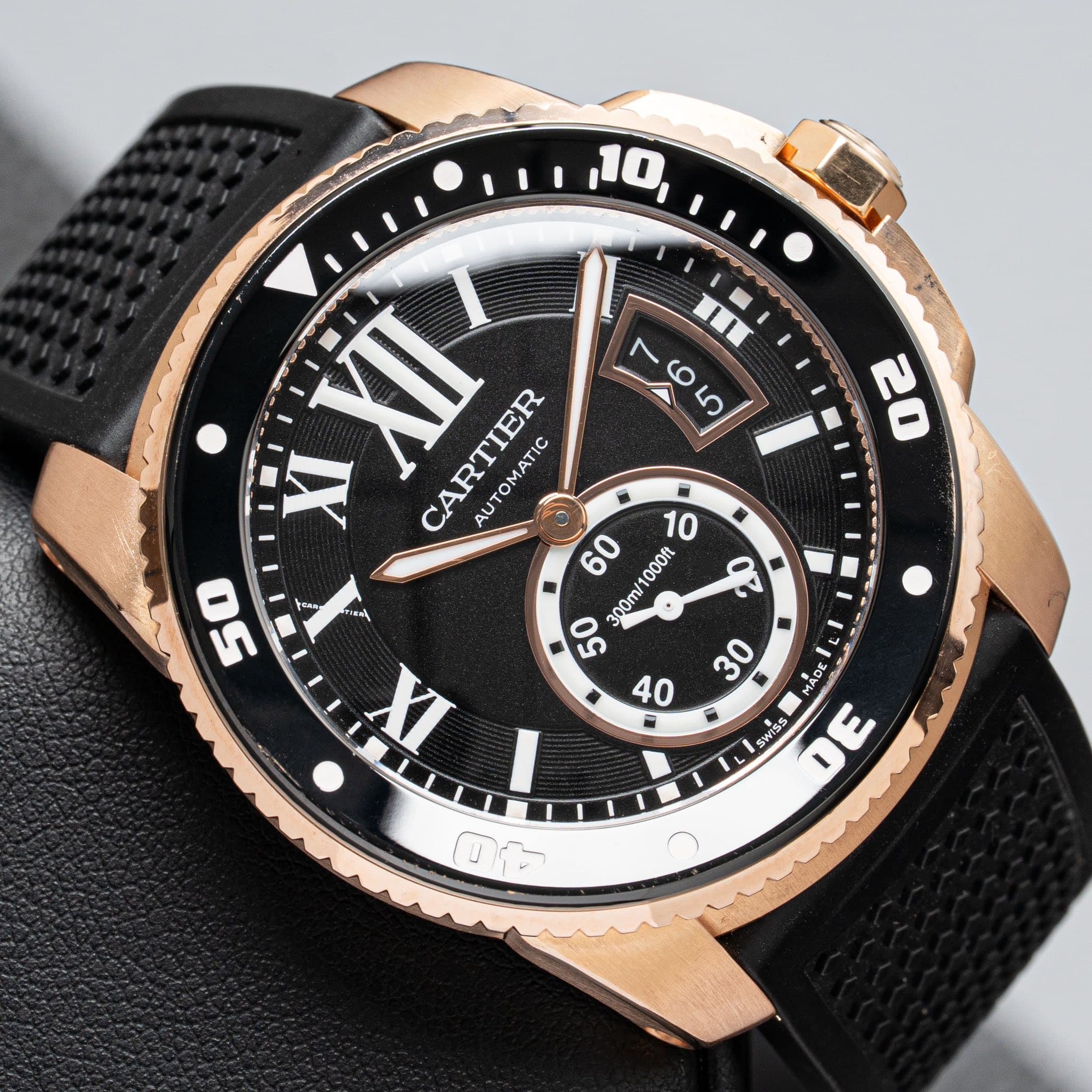 May be an image of digital watch and text that says ' XI XII CARTIER AUTOMATIC O 60 50 00m/1000ft 1000ft 50 30 MADE SwISS 40 ขิ MENL A DA D'