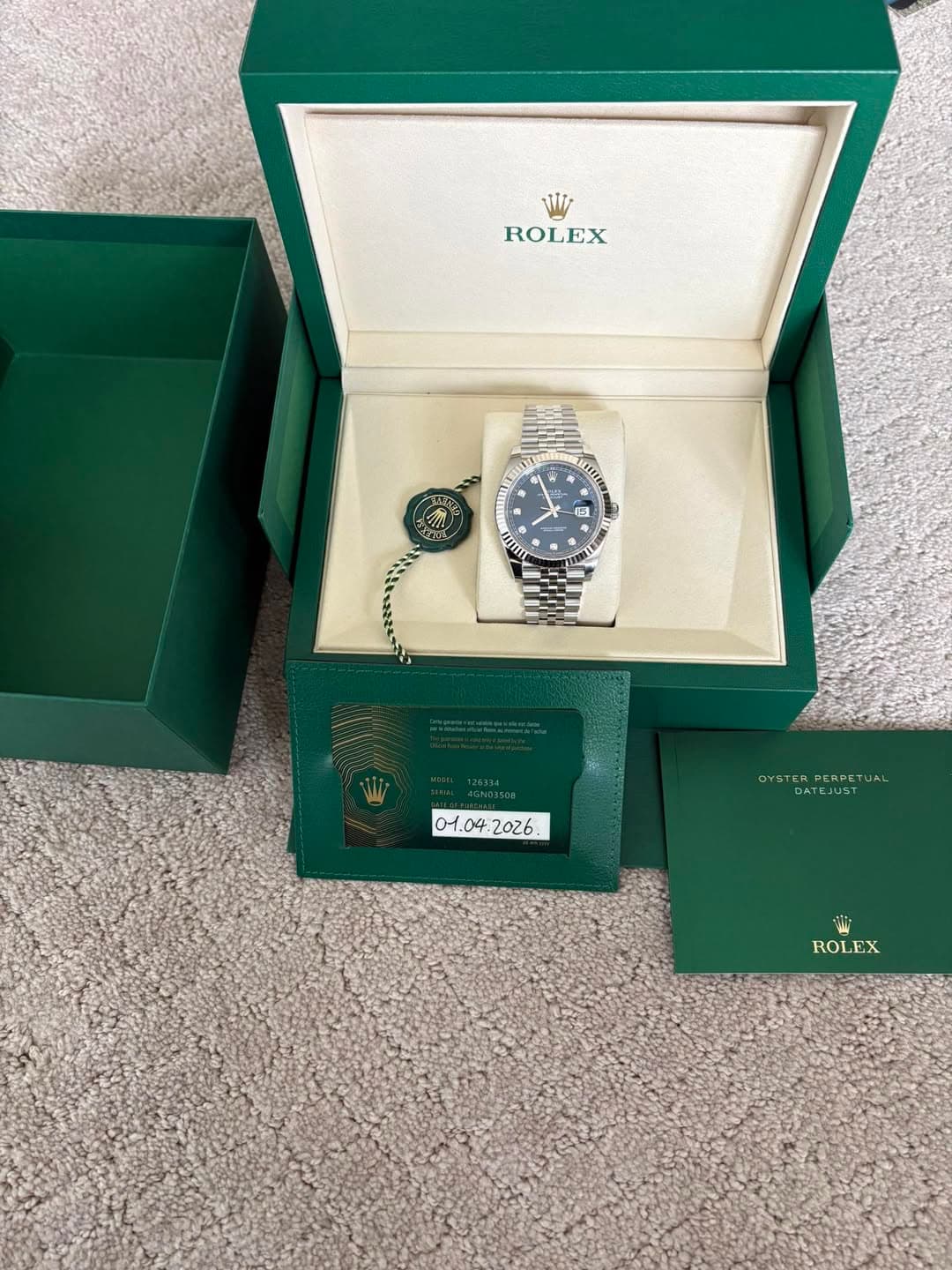 May be an image of wrist watch and text that says 'WI ROLEX # F 를 2 อ E F : اللل ব . 0H. 01.04 OYSTERPERPETUAL TERPERPETUAL DATEJUST शम ROLEX'