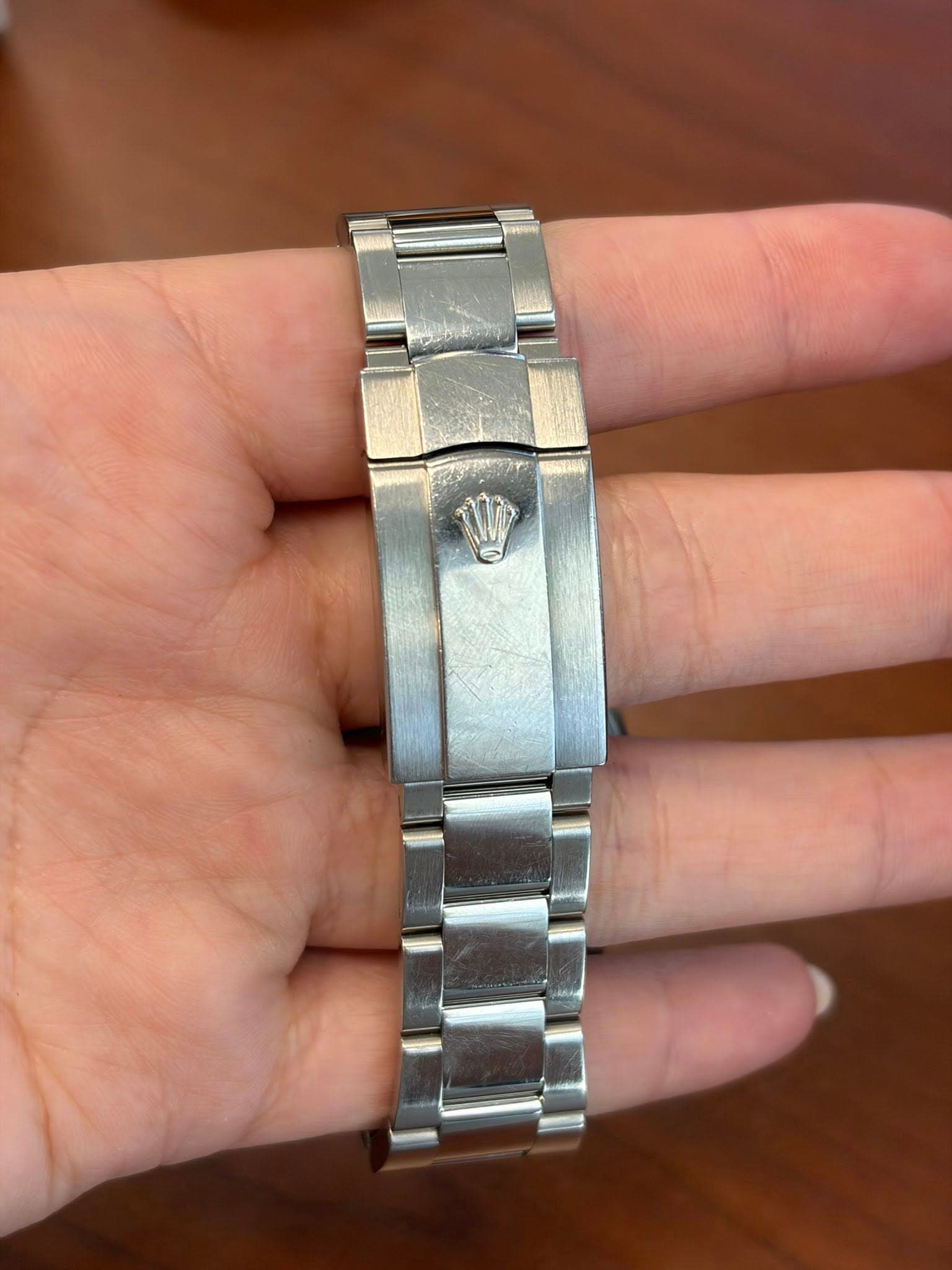 May be an image of wrist watch