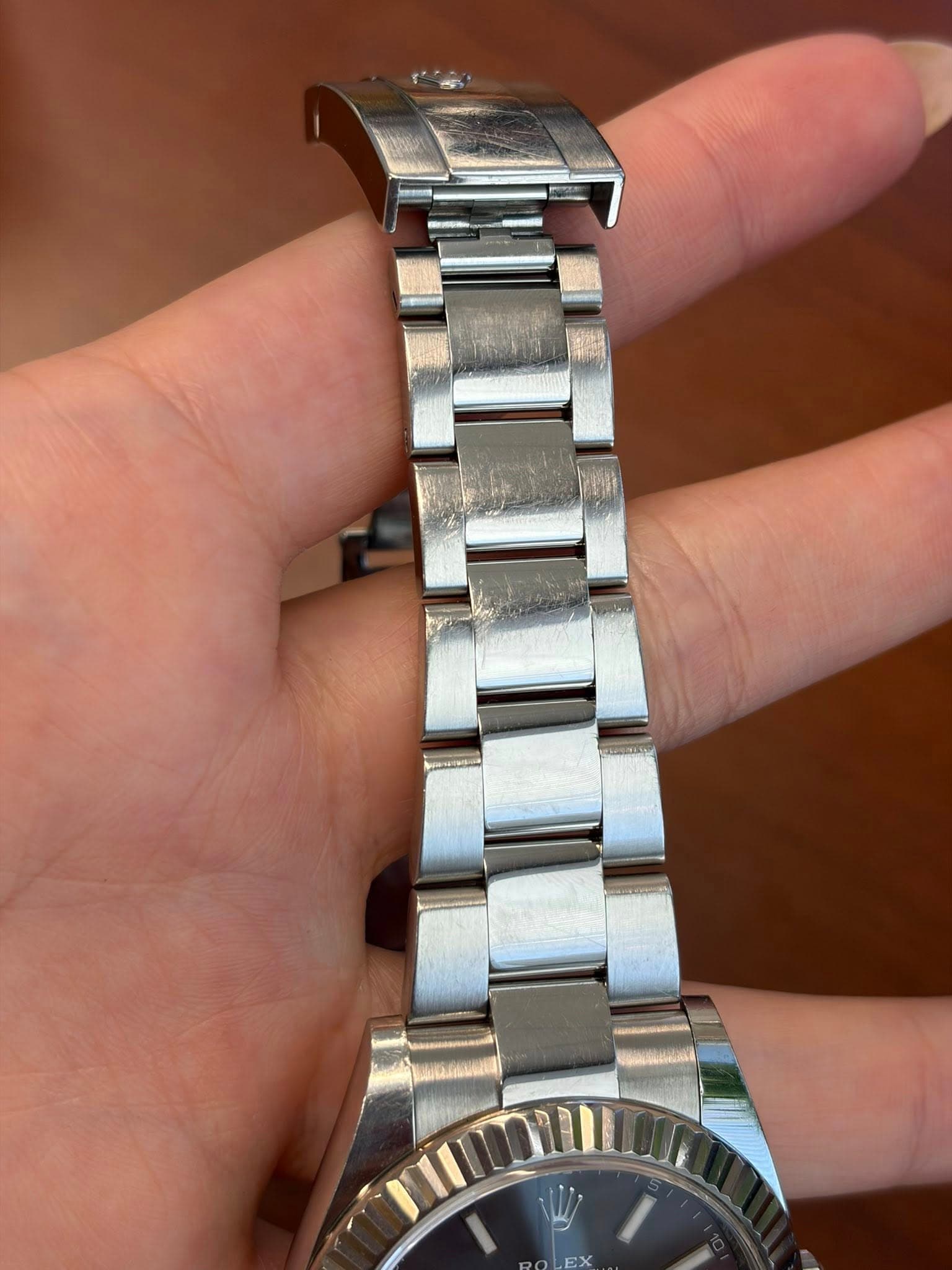 May be an image of wrist watch