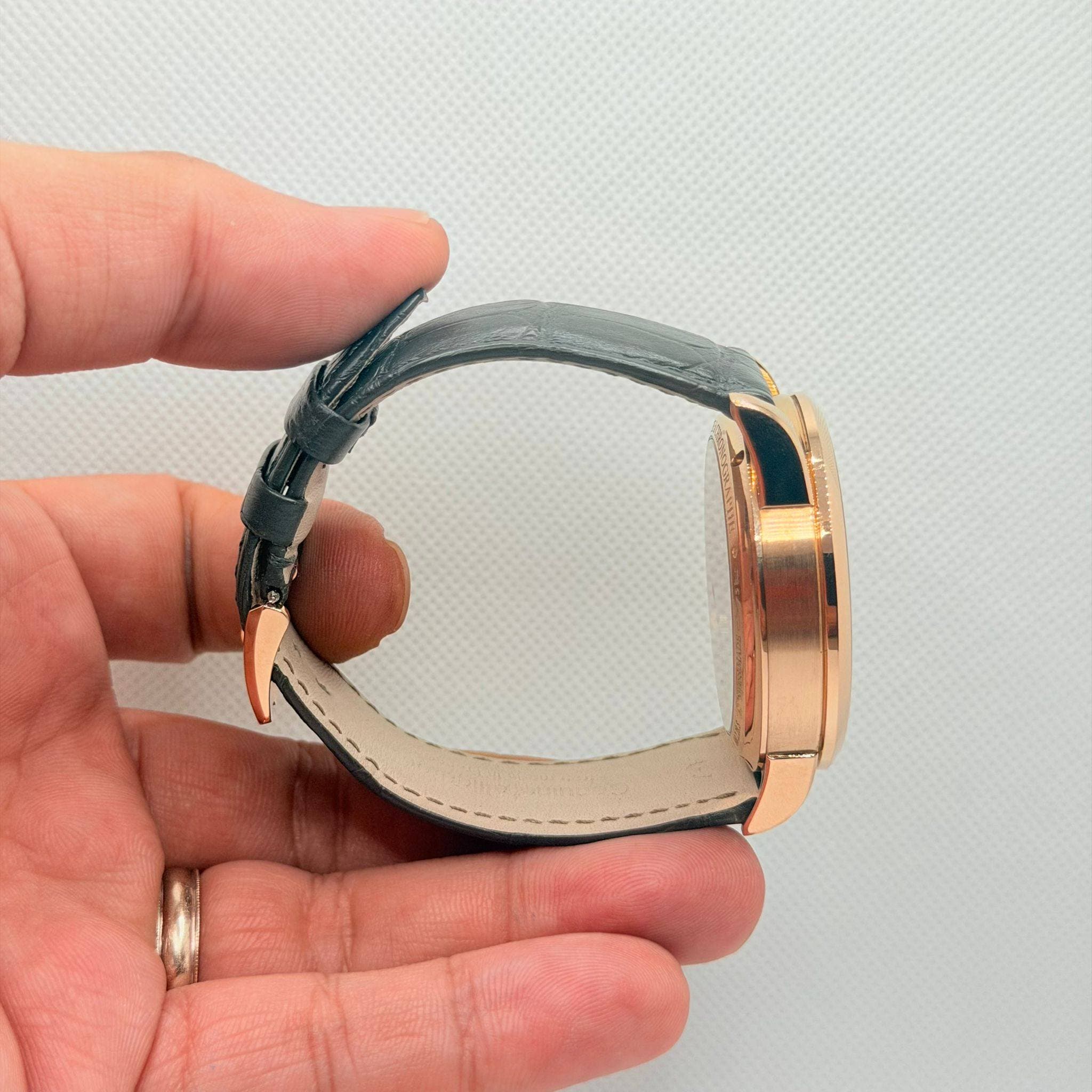 May be an image of jewelry, leather and wrist watch