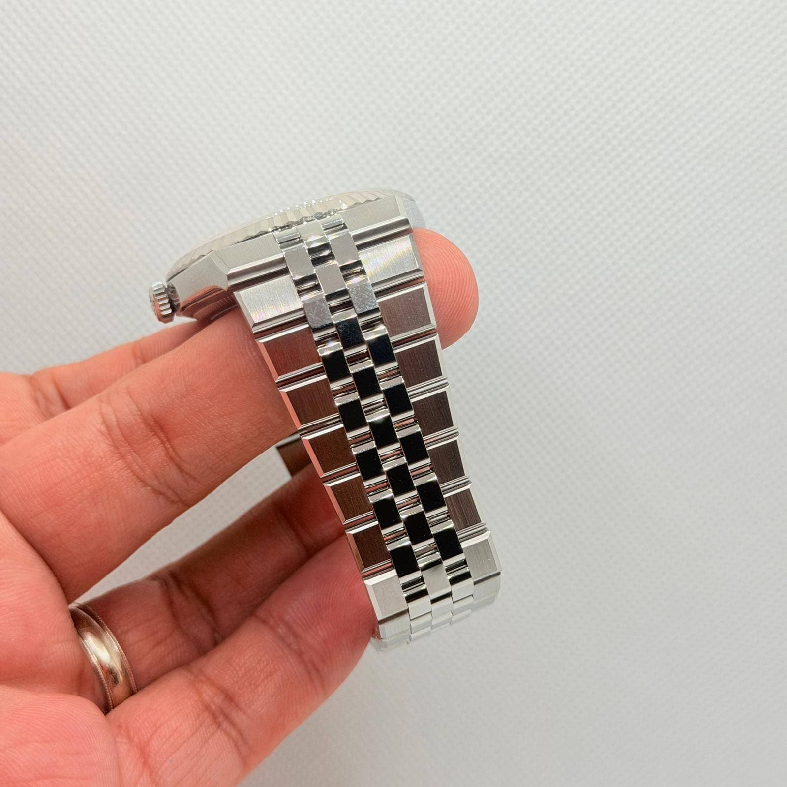May be an image of digital watch and text