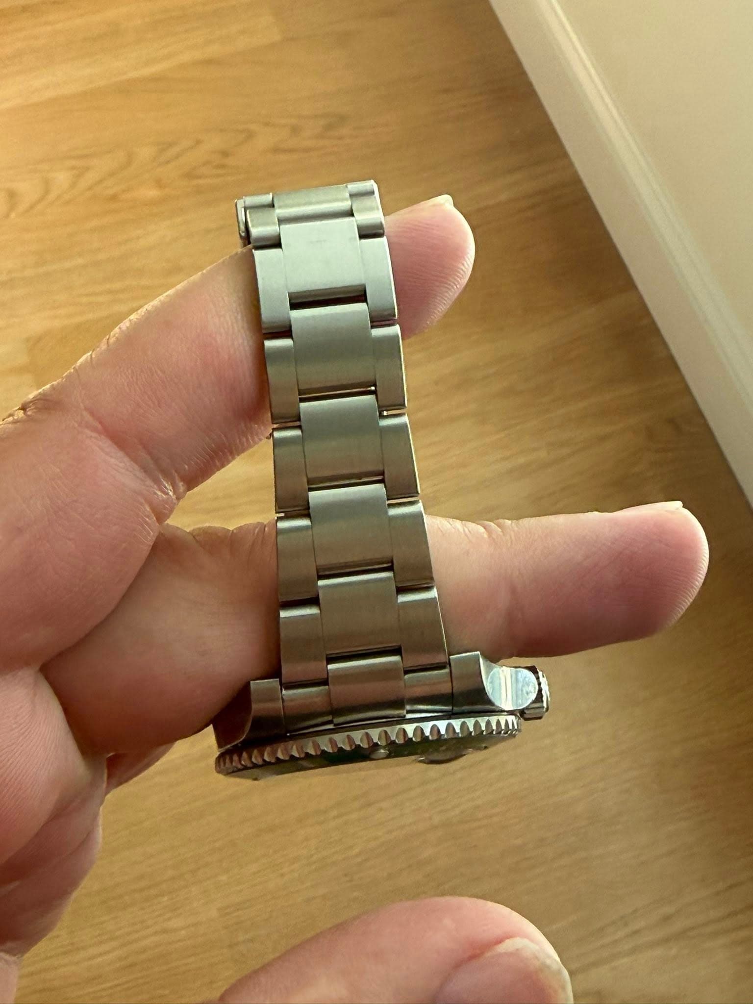 May be an image of wrist watch