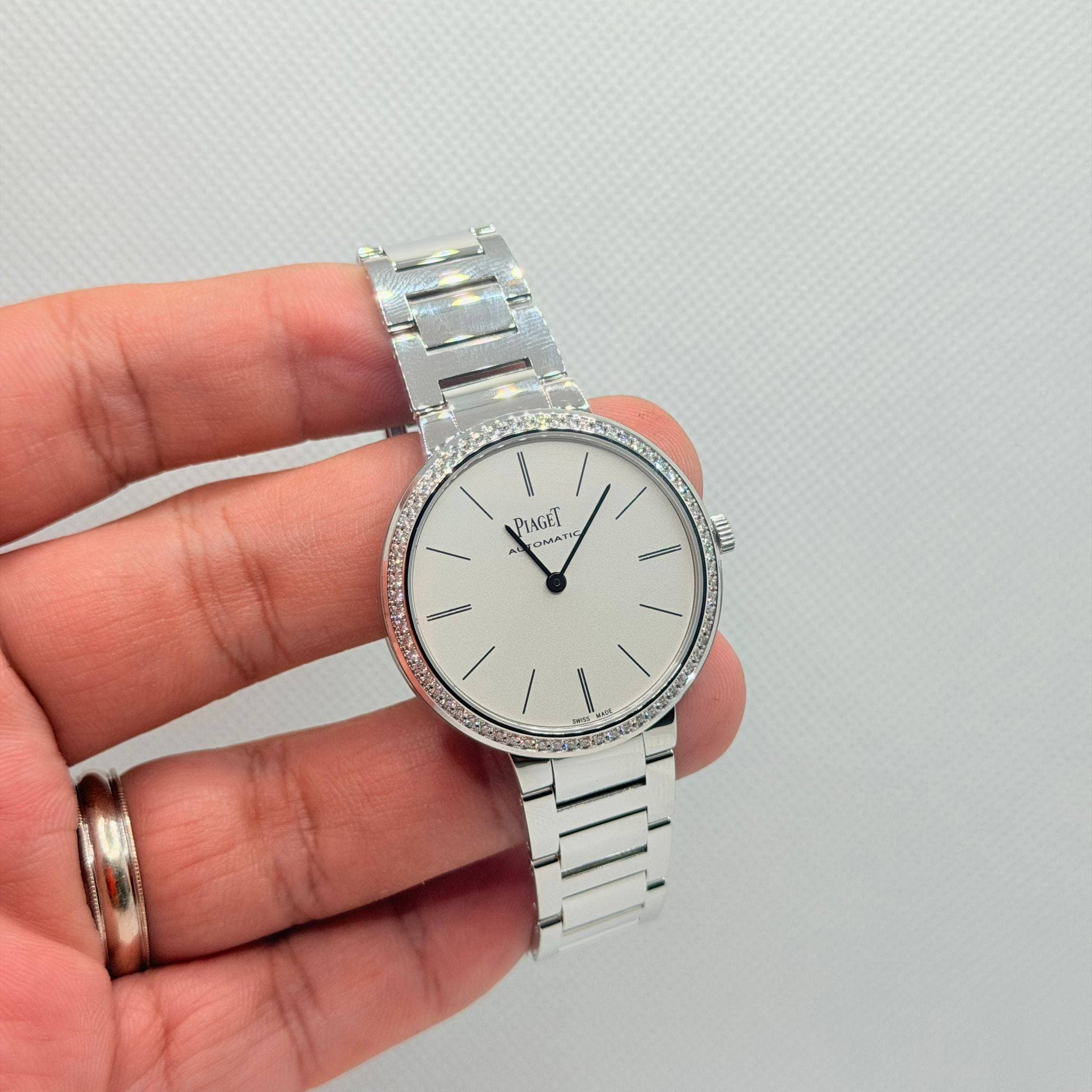 May be an image of wrist watch