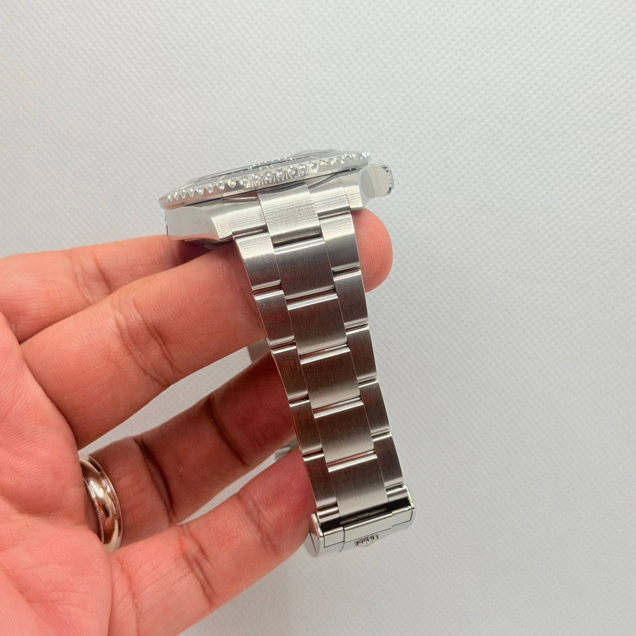 May be an image of wrist watch