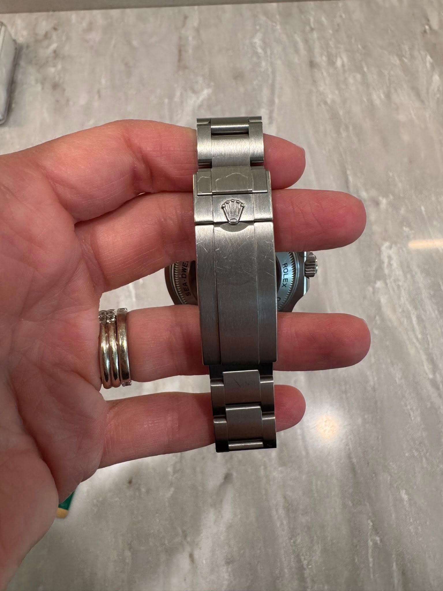 May be an image of wrist watch