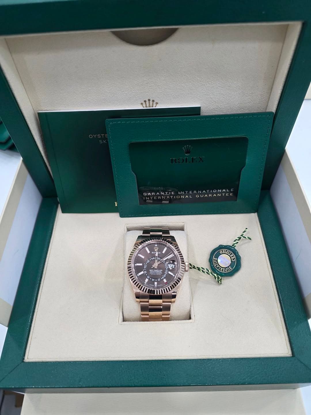 May be an image of wrist watch and text
