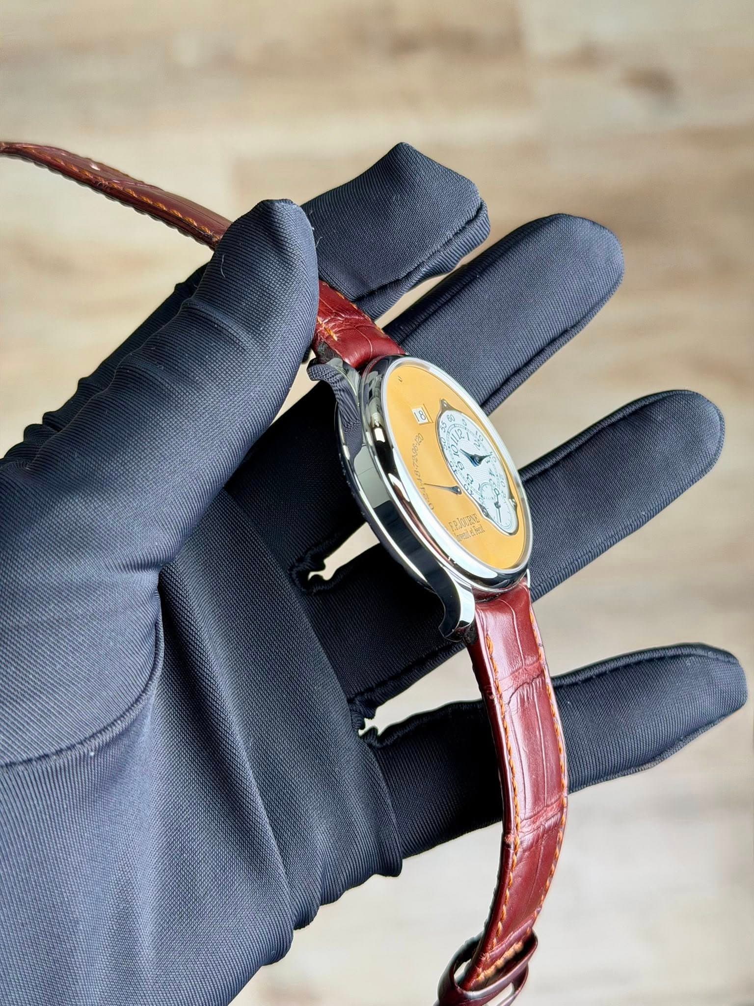 May be an image of wrist watch and text