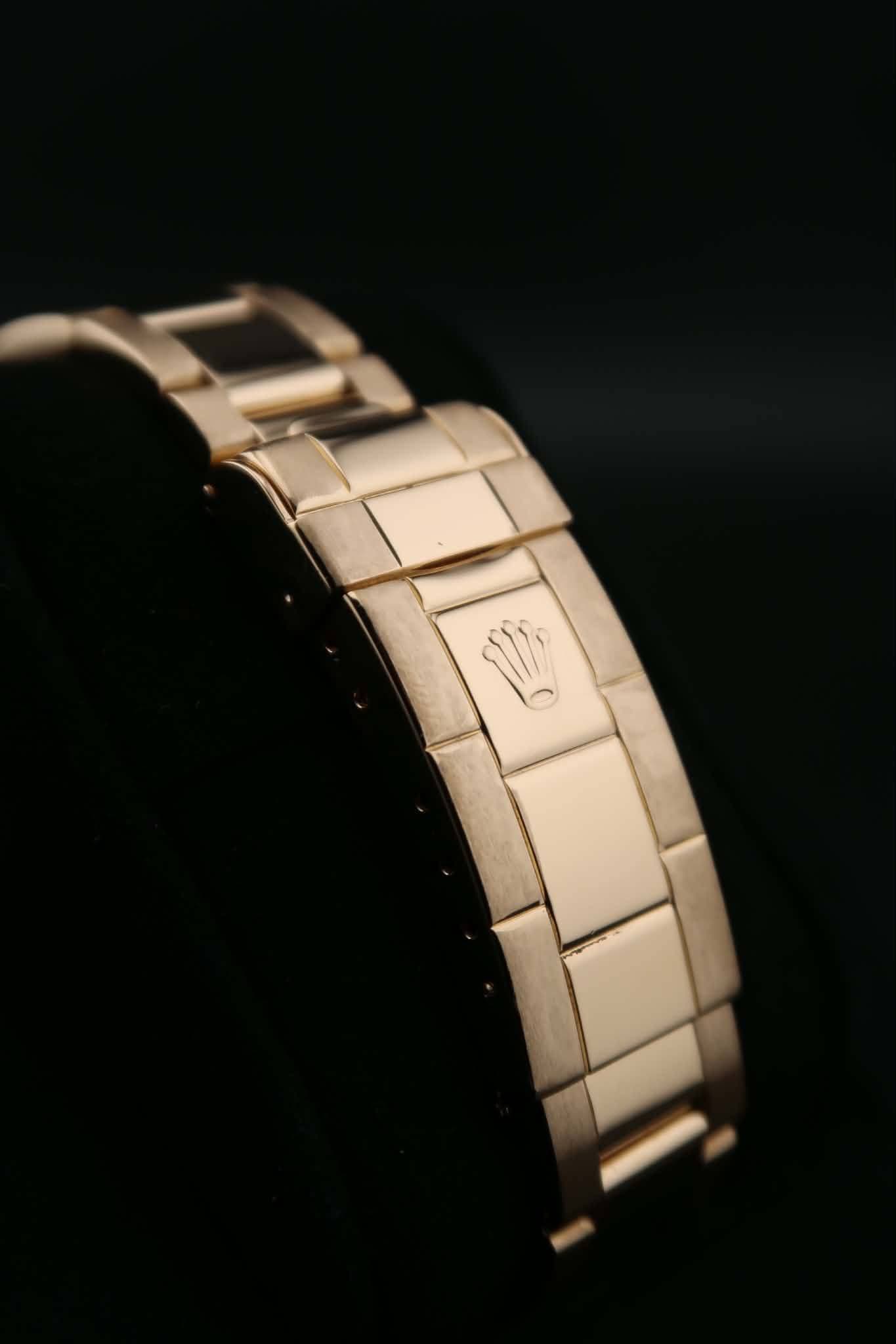 May be an image of jewelry, digital watch and text