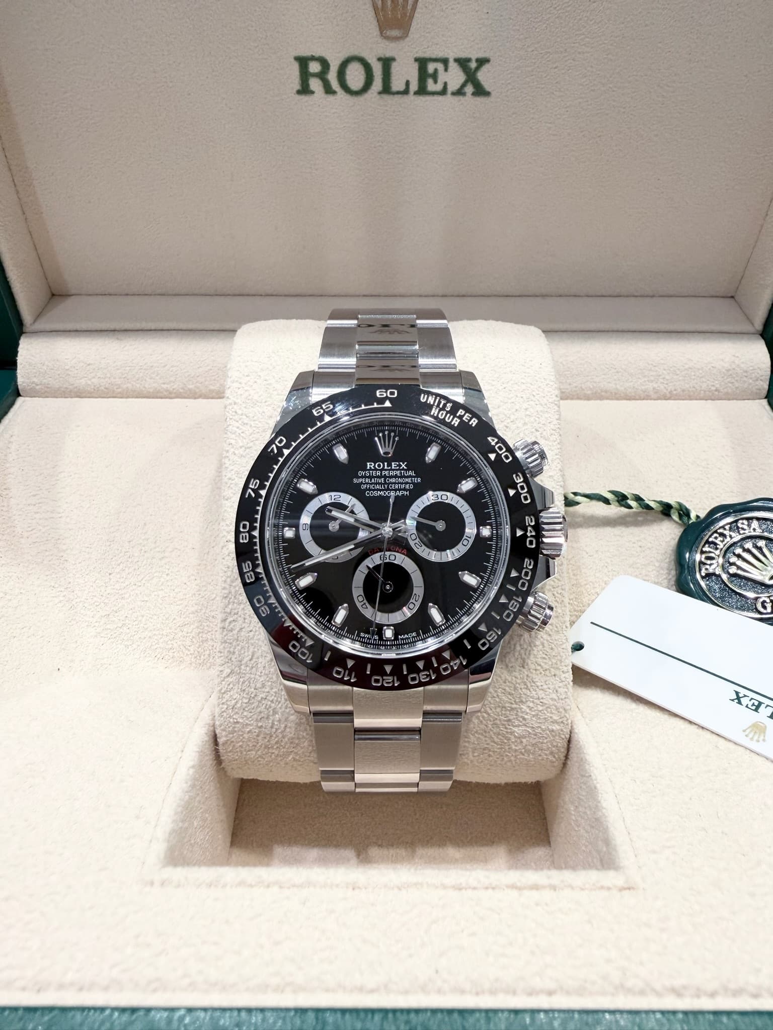 May be an image of wrist watch and text