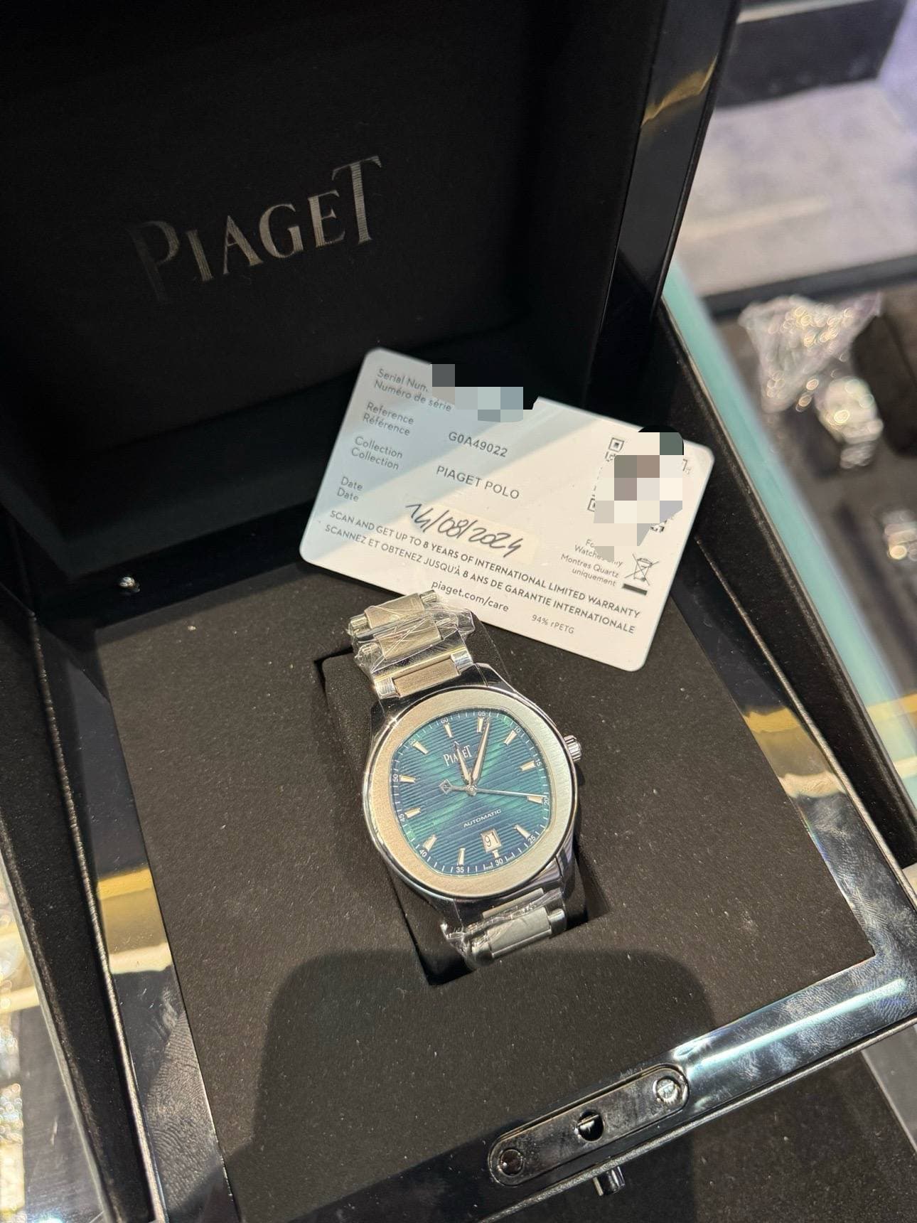 May be an image of wrist watch and text