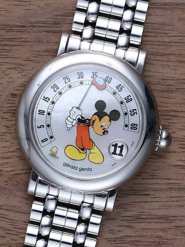 May be an image of wrist watch and text