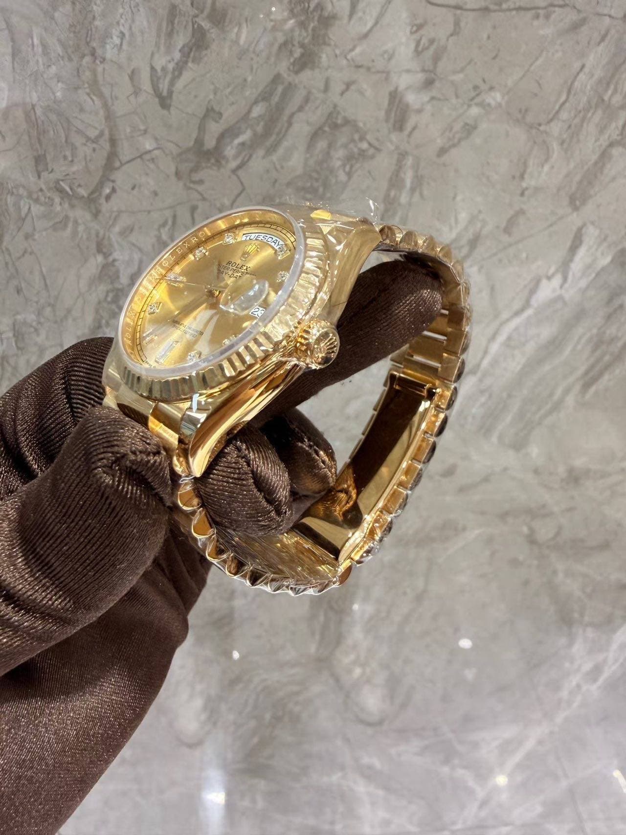 May be an image of wrist watch