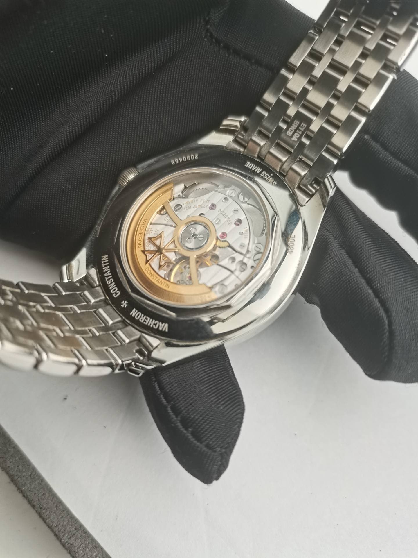 May be an image of wrist watch and text