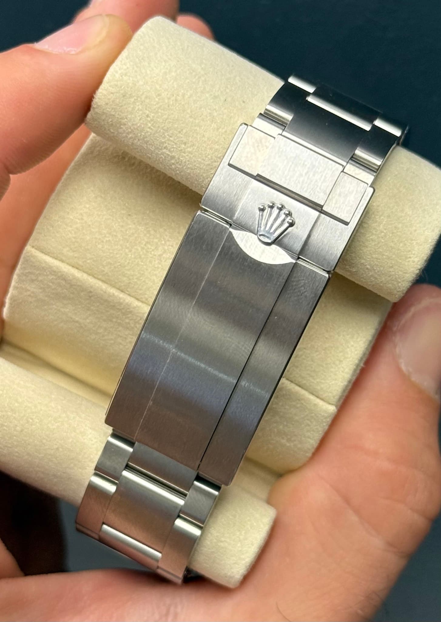 May be an image of wrist watch and text