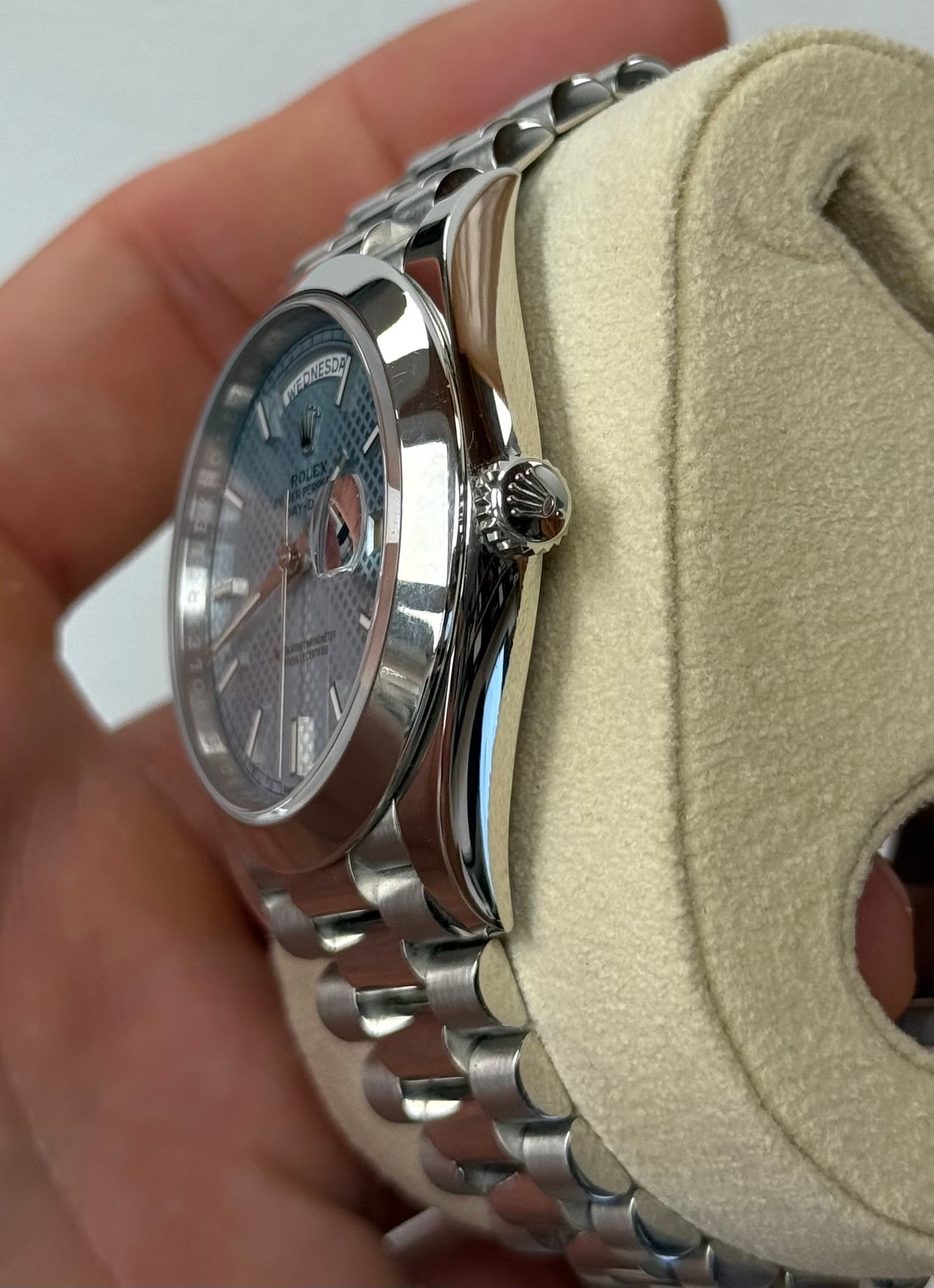 May be an image of wrist watch and text