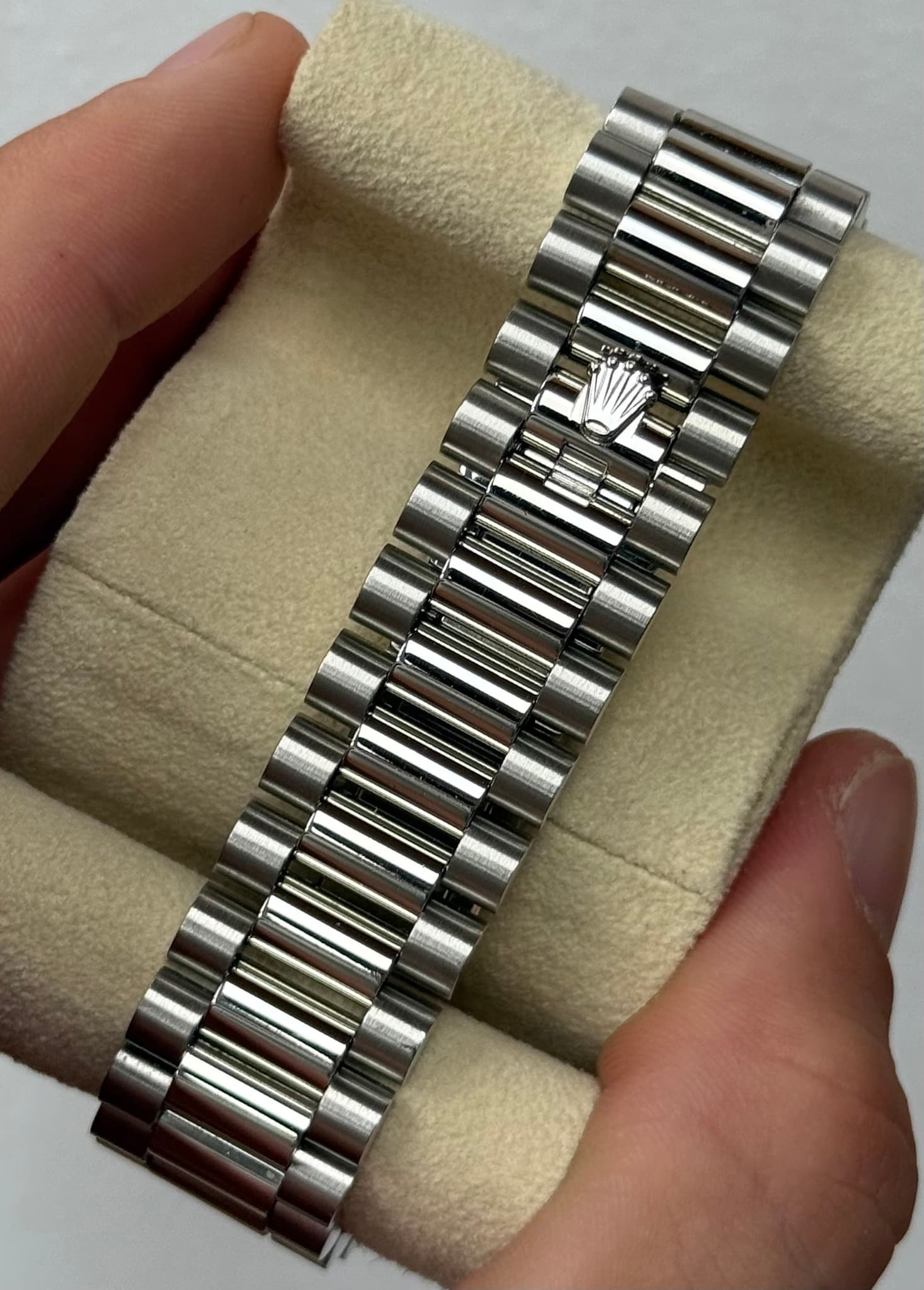 May be an image of wrist watch and jewelry