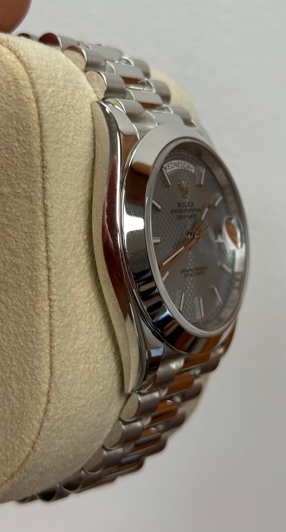 May be an image of wrist watch and text