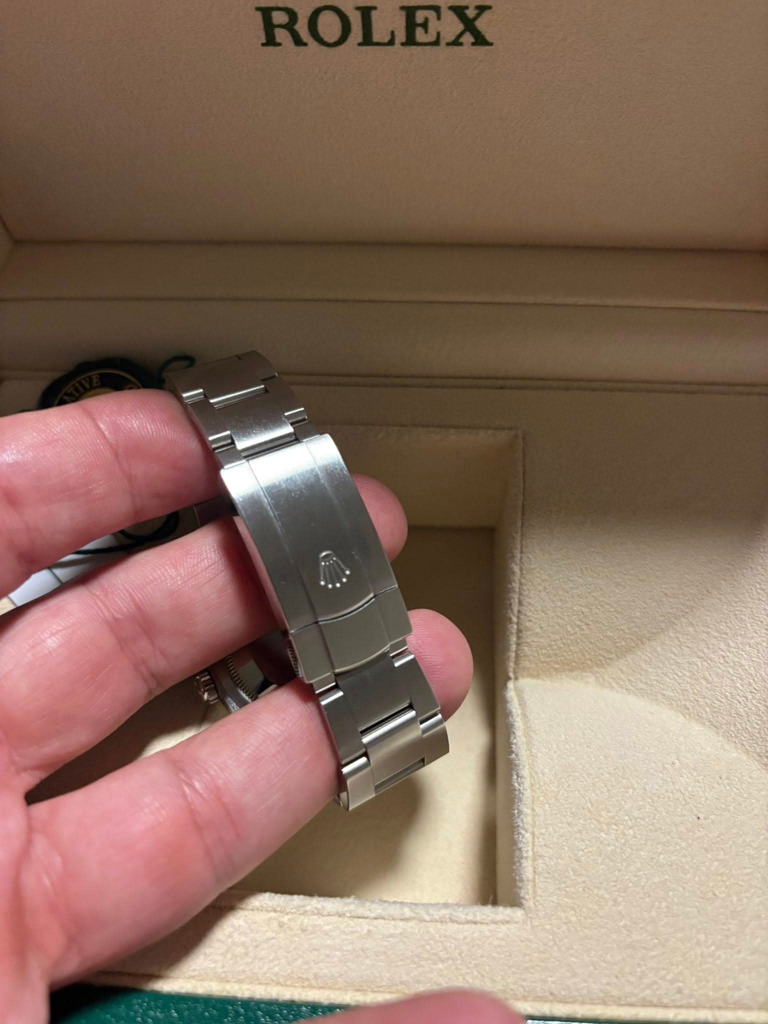 May be an image of wrist watch