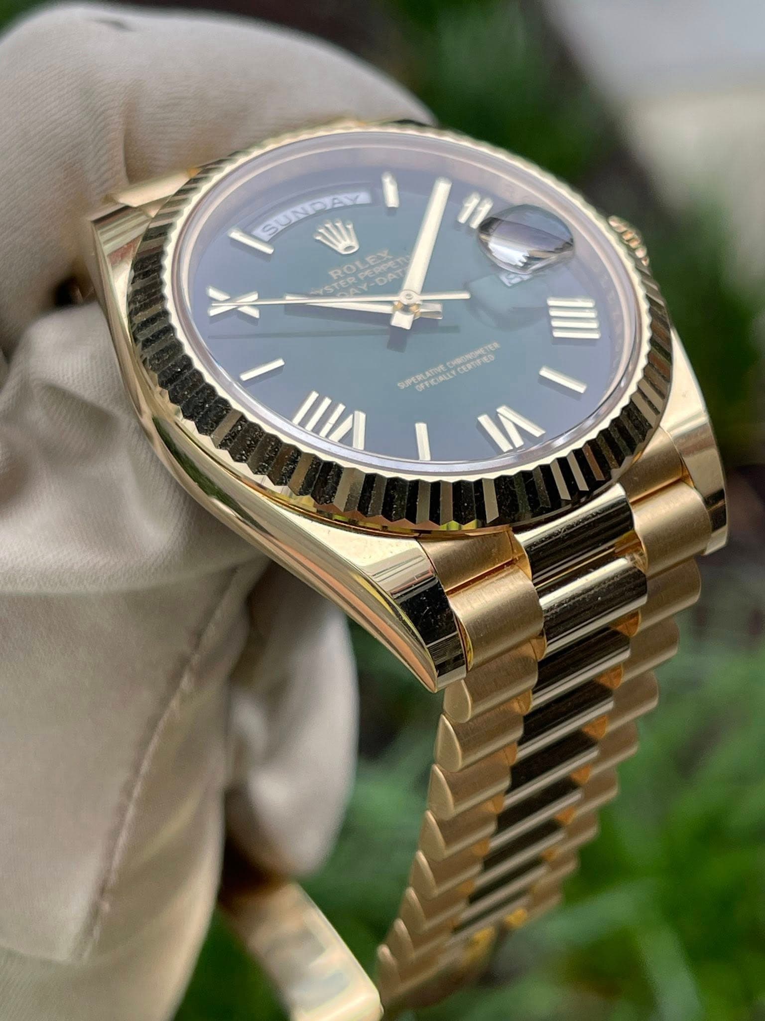 May be an image of wrist watch and text