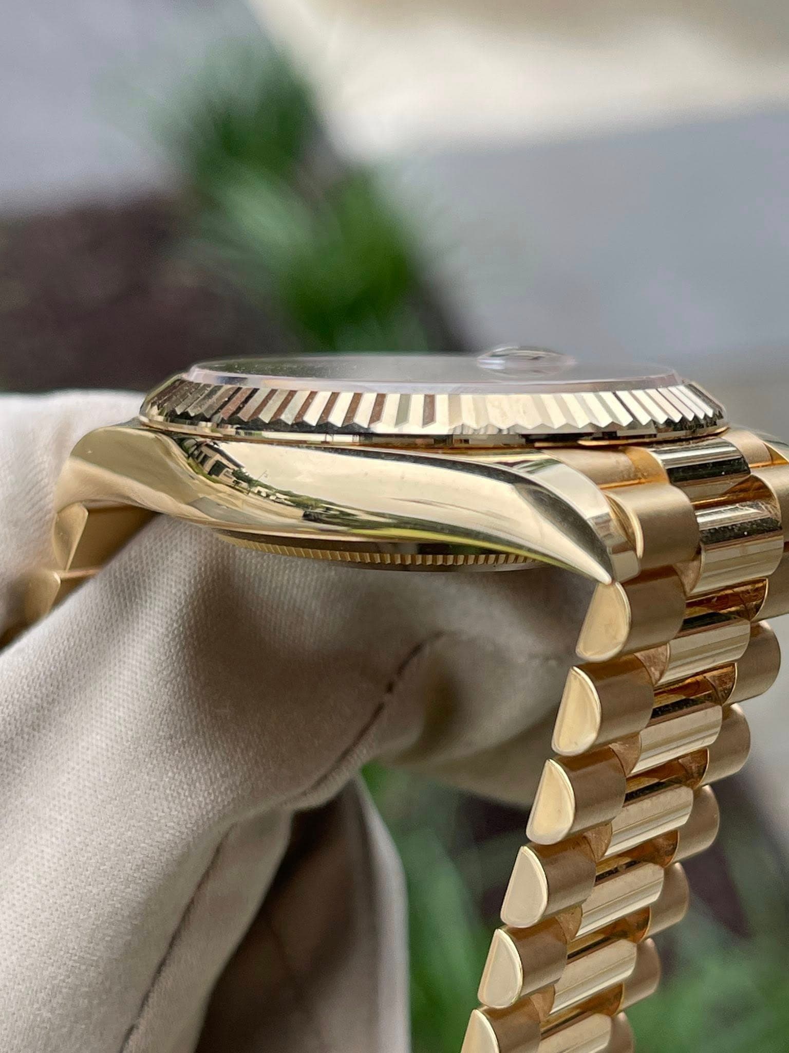 May be an image of wrist watch and text