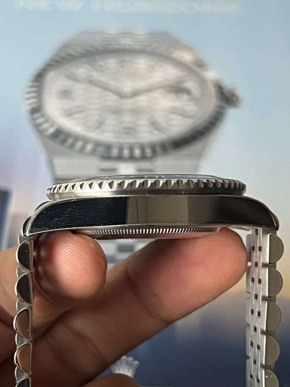 May be an image of wrist watch