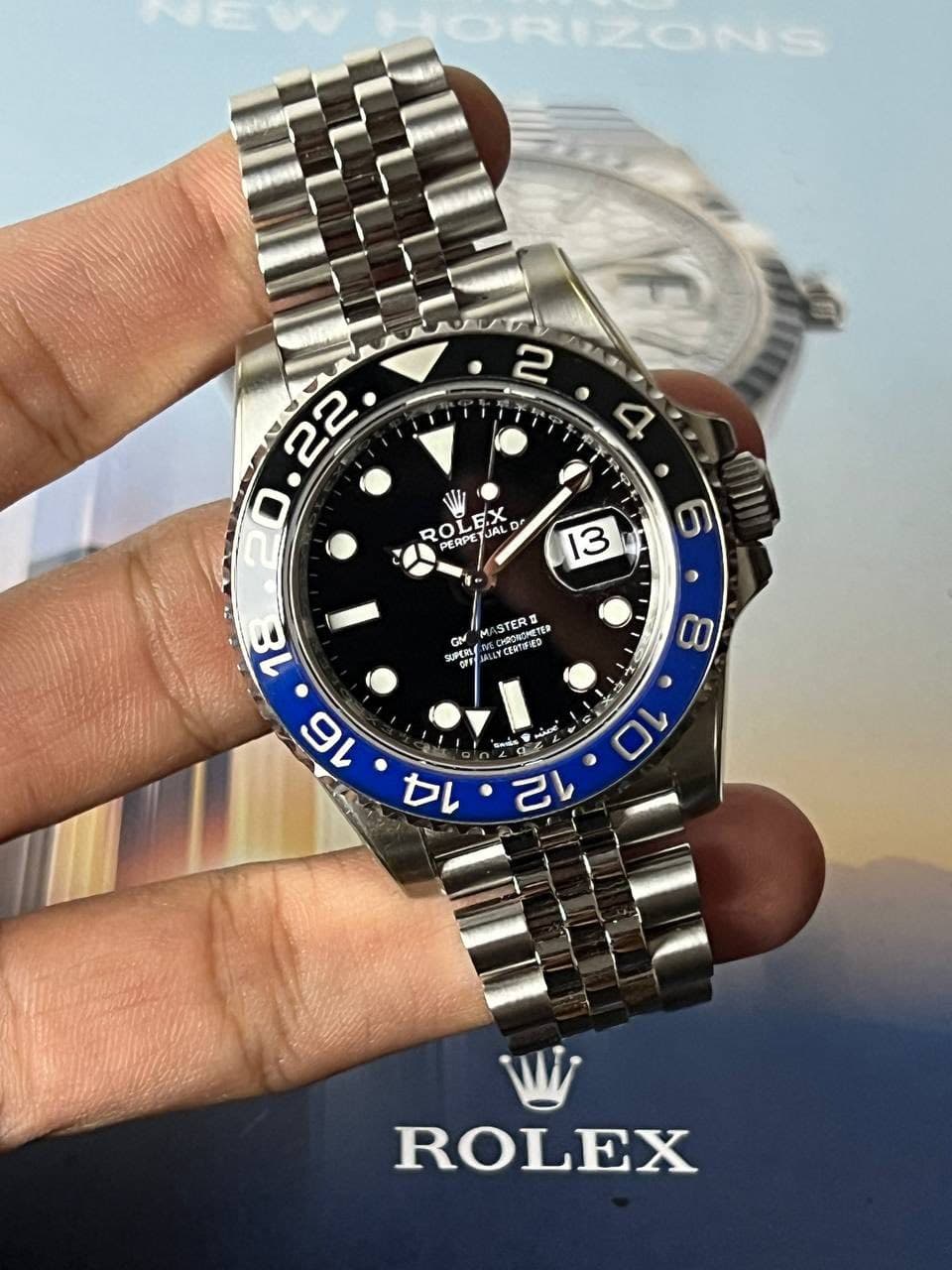 May be an image of wrist watch and text