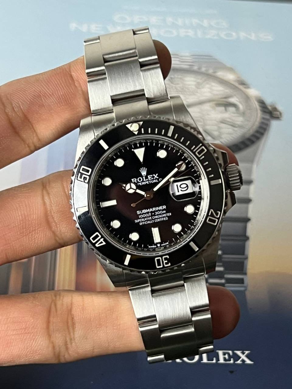 May be an image of wrist watch and text