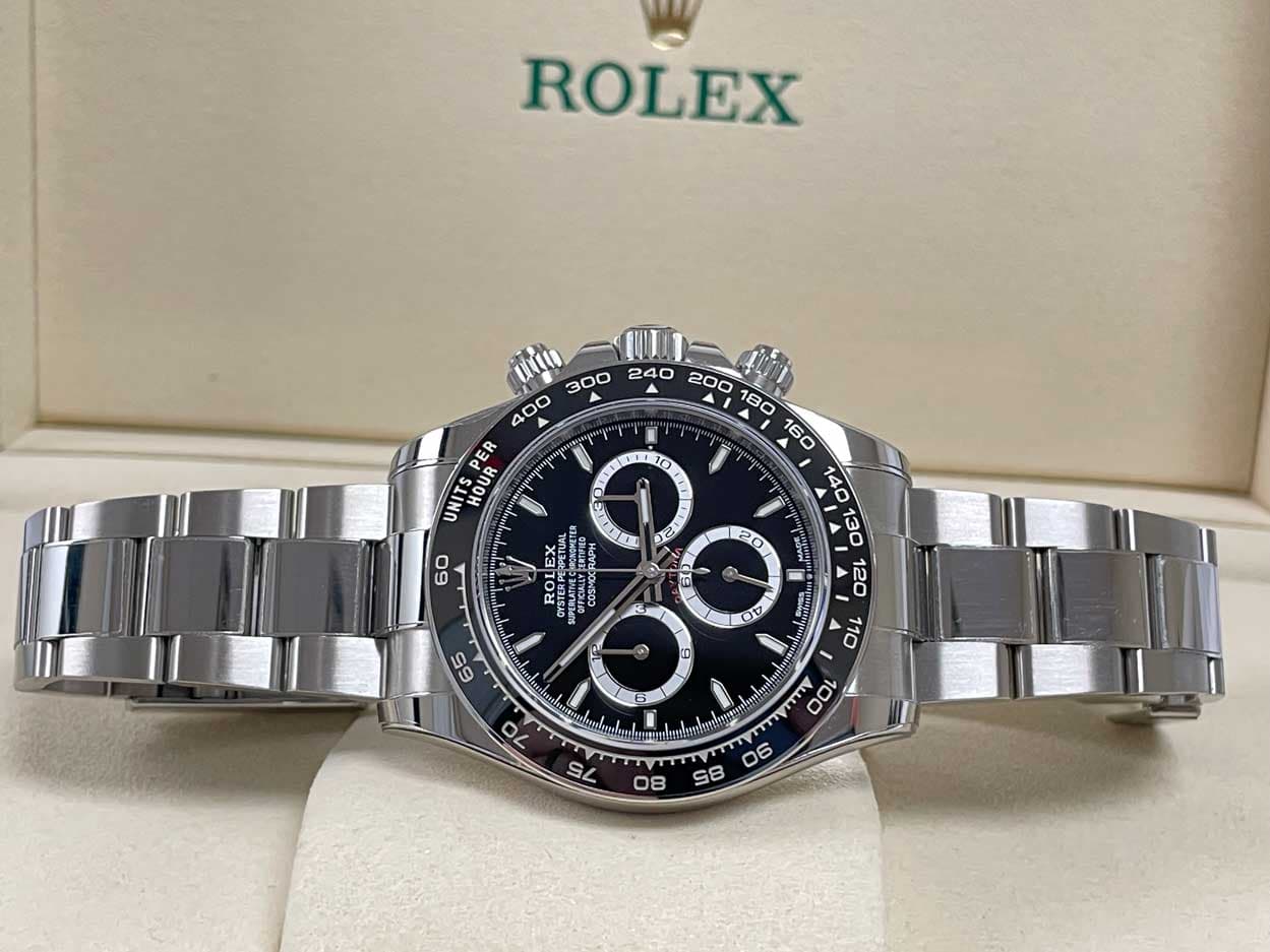 May be an image of wrist watch and text that says 'ROLEX ER 160 UNITS HOUR សភ្តុជ fO C 60 20 ROPRPETUAL CSTER COSVDE เ CORTFNE P m 06 85'