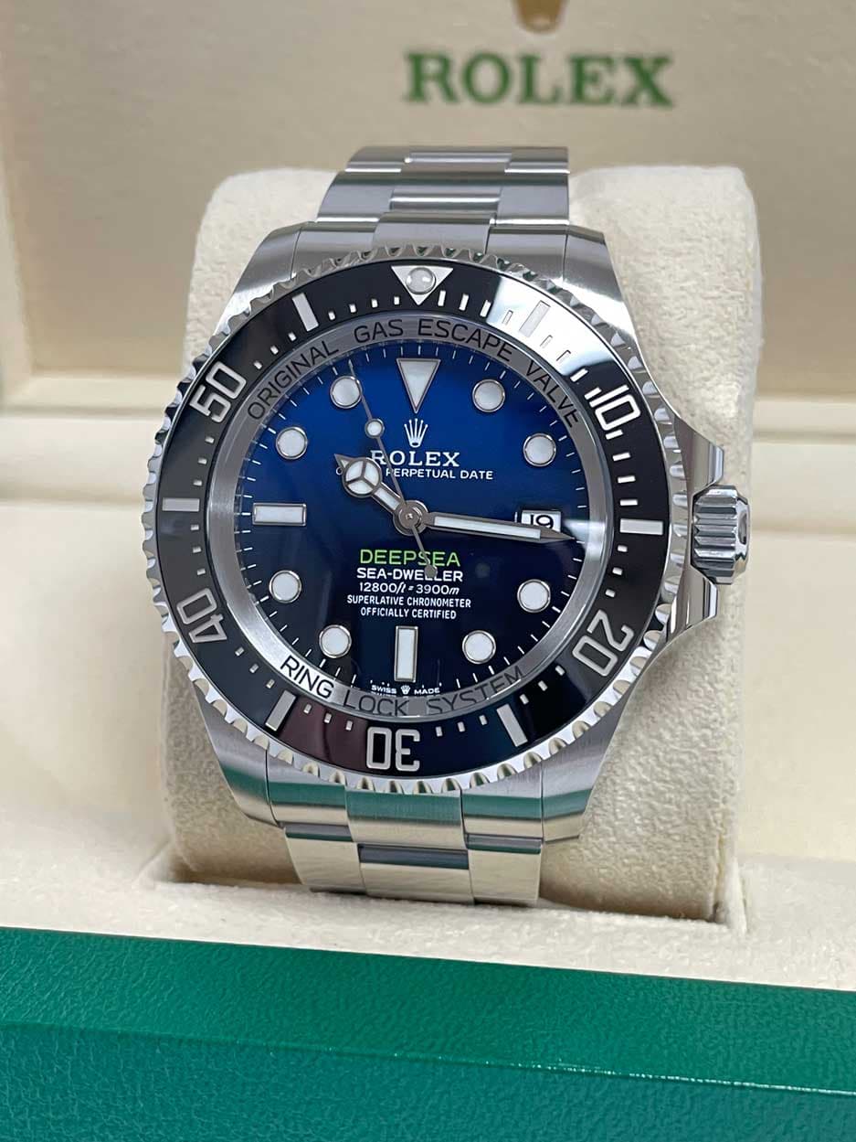 May be an image of wrist watch and text that says 'ROLEX 50 r [ 10 ROLEX R EX ERPET DATE 19 DEEPSEA SEA-DWELL SEA-D DWELLER LER ER UPRETER OFE 12800 SIPERLATIM SUPER SUPERLA…