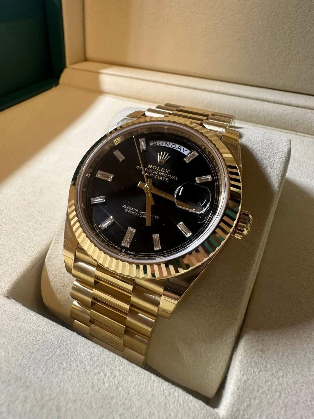 May be an image of wrist watch and text
