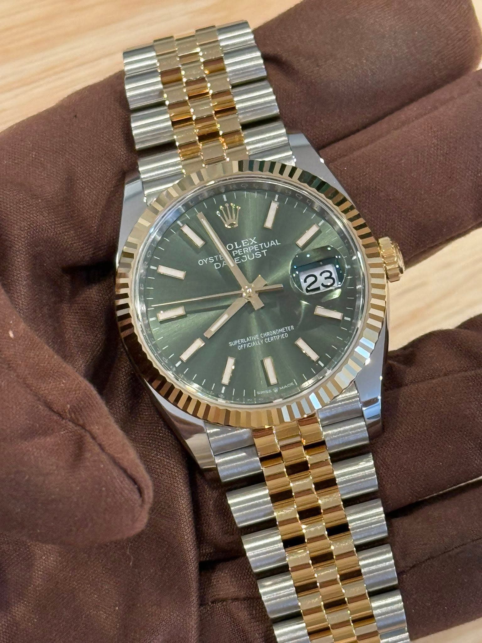 May be an image of wrist watch and text