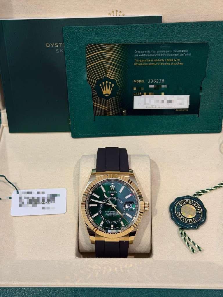 May be an image of wrist watch and text