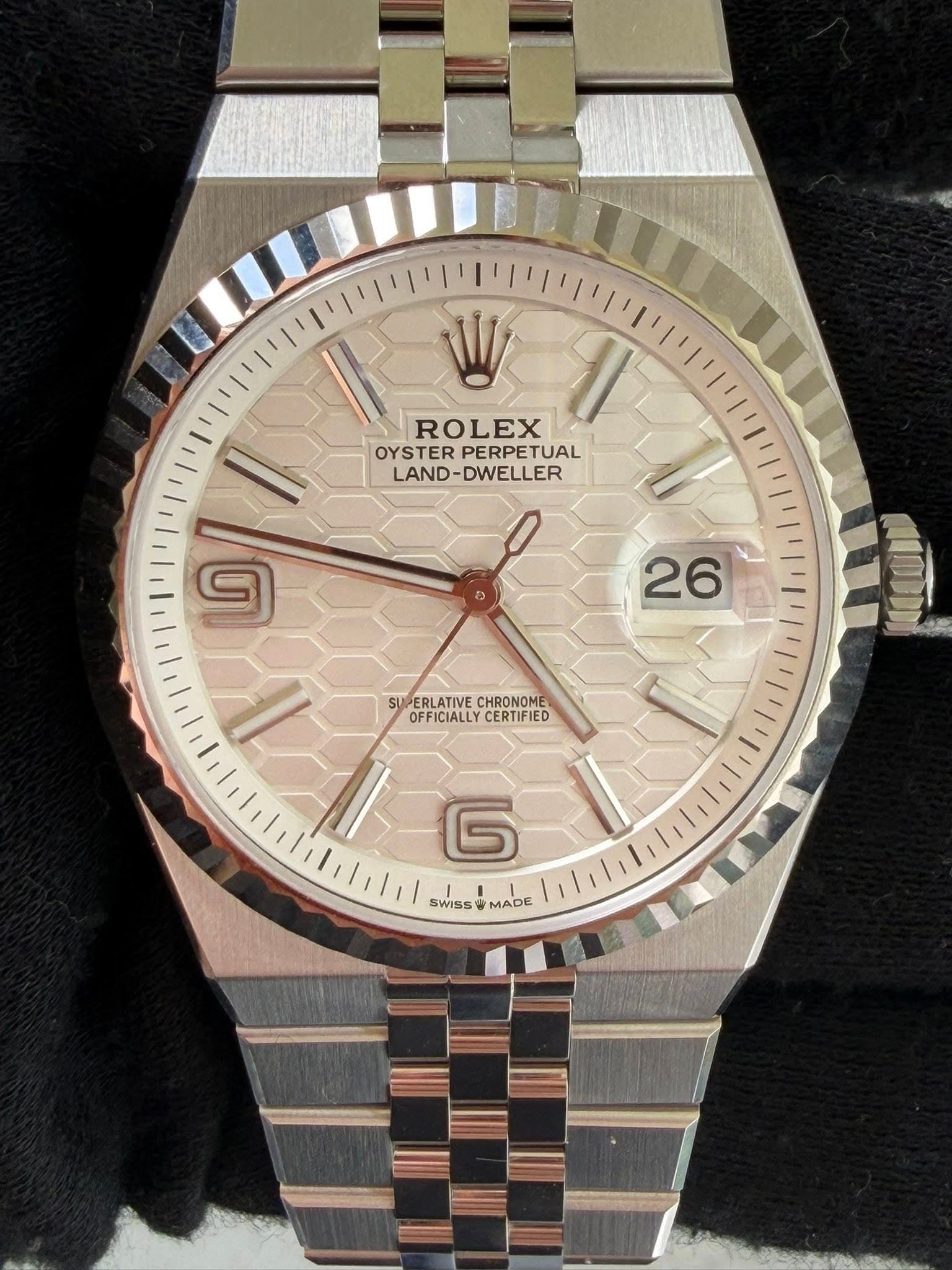 May be an image of wrist watch and text that says 'ROLEX OYSTER PERPETUAL LAND- LAND-DWELLER 9 26 SUPERLATIVECHRONOME SUPERLATIVE CHRONOME OFFICIALLY OFFICIALLYCERTIFIED CERTIFIED…
