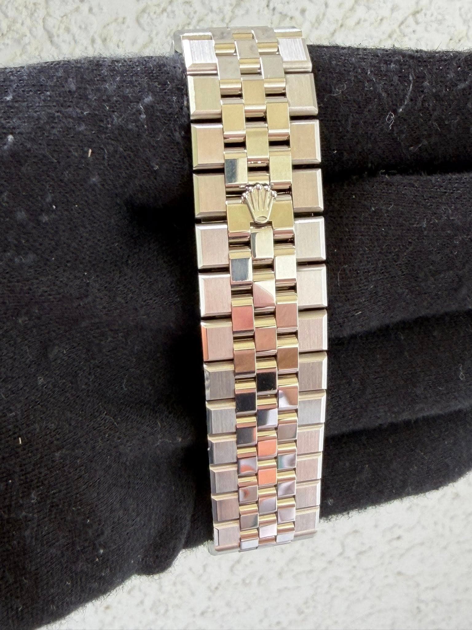May be an image of wrist watch