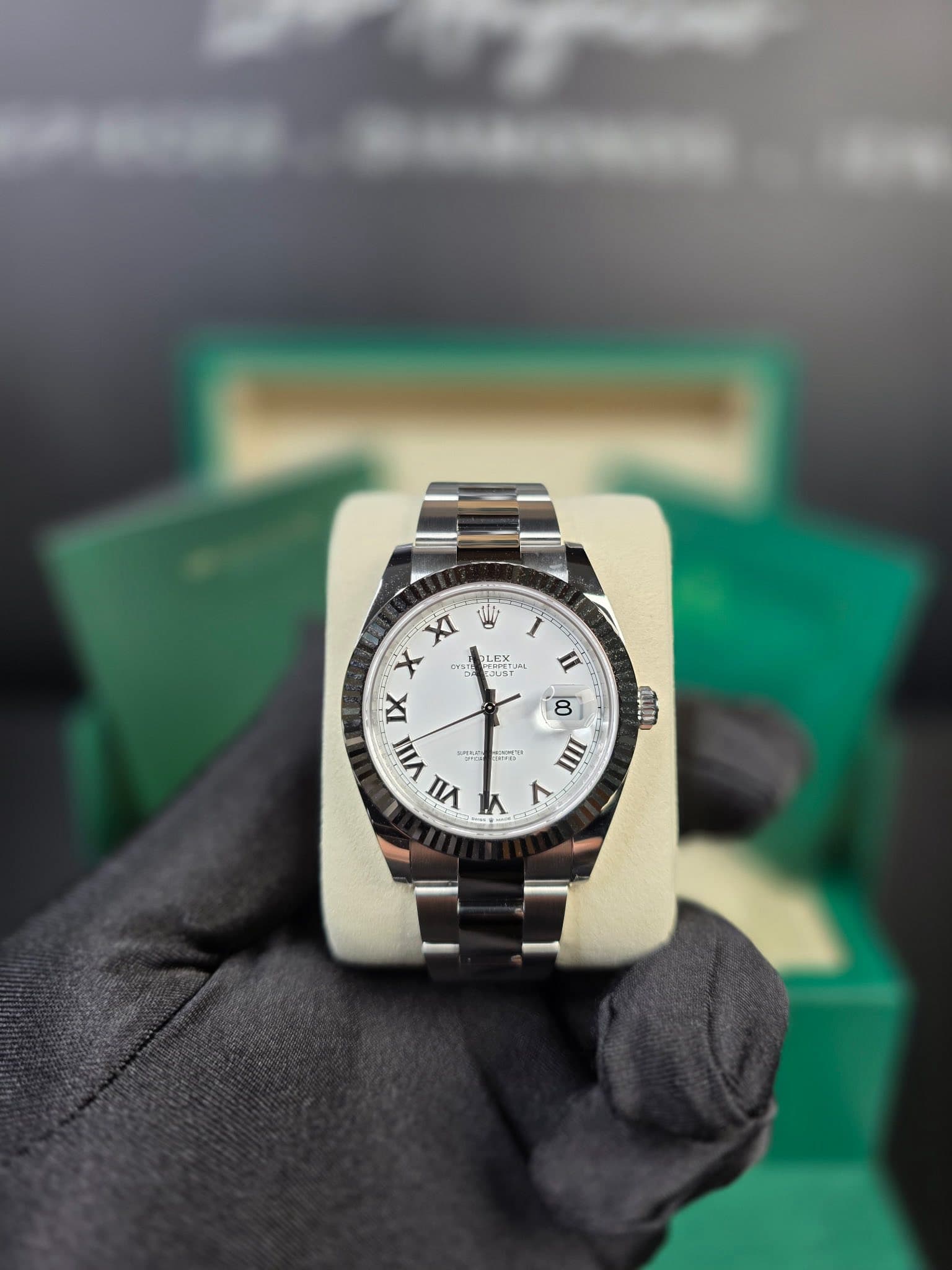 May be an image of wrist watch and text