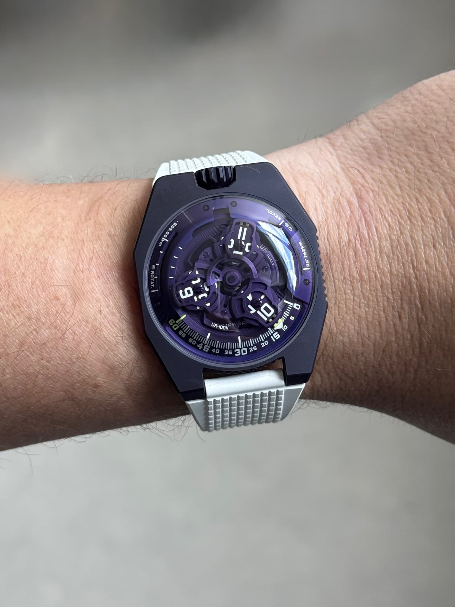 May be an image of wrist watch and text