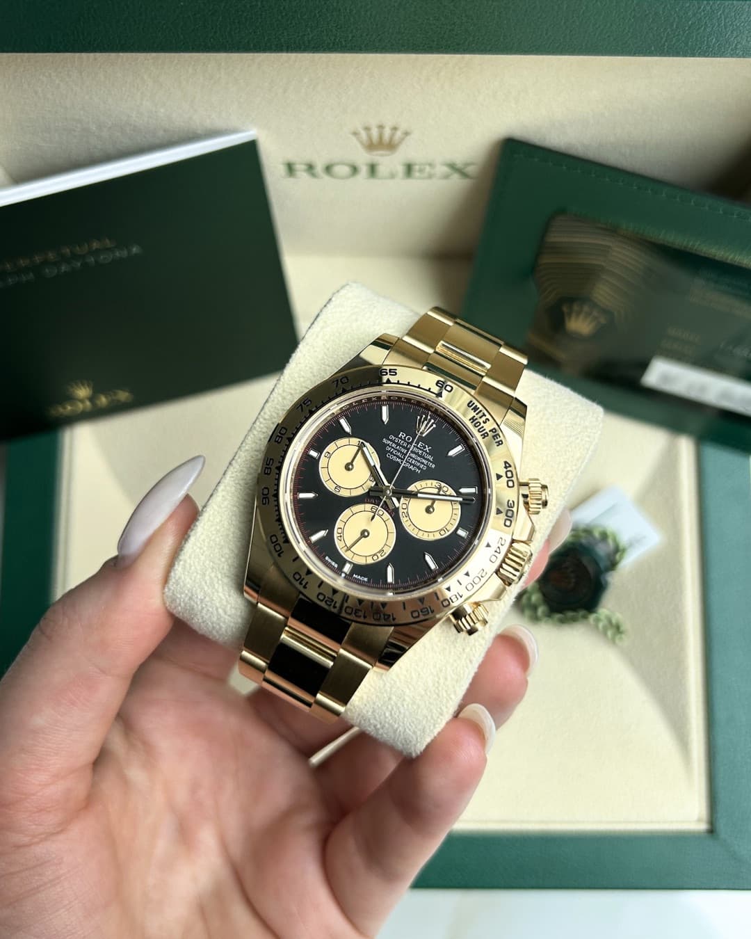 May be an image of wrist watch and text