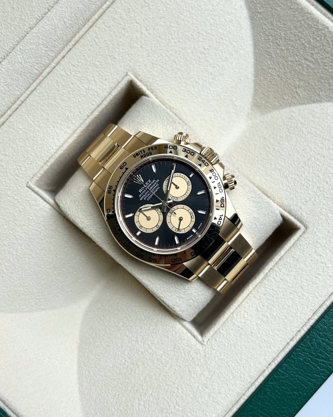 May be an image of wrist watch and text