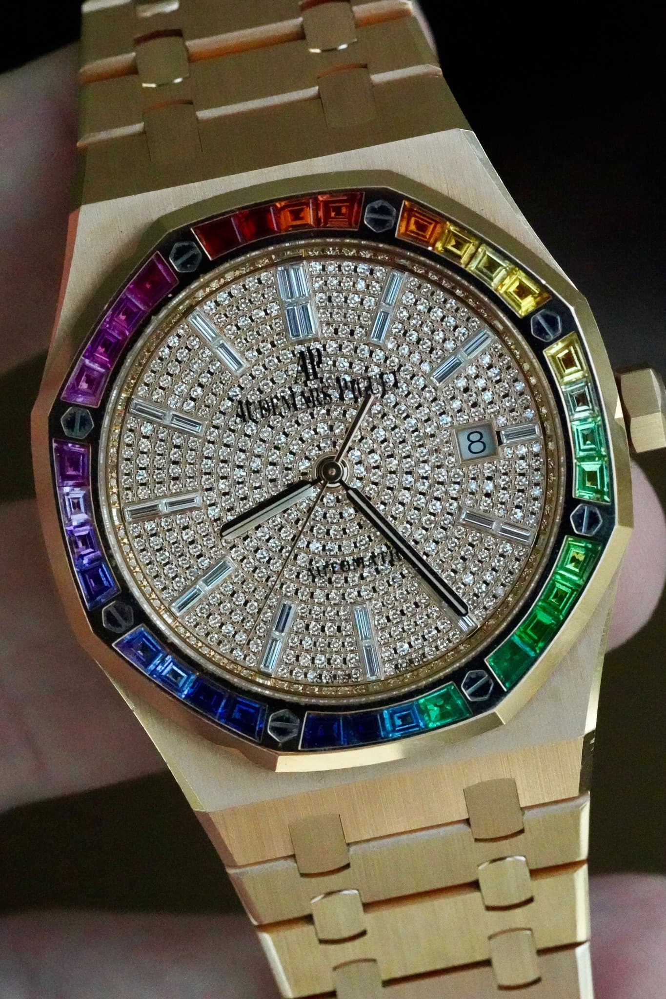May be an image of wrist watch and text