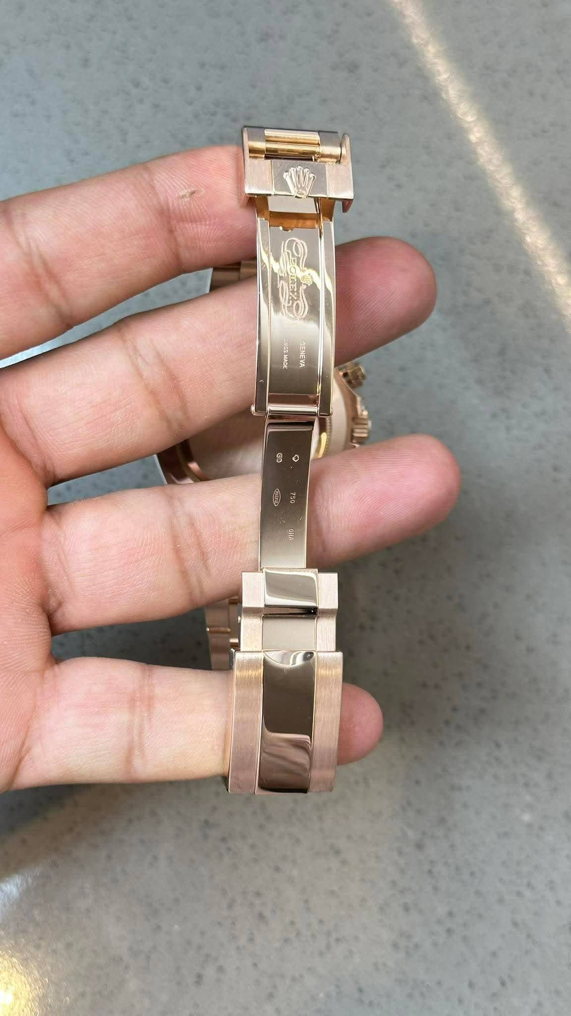 May be an image of wrist watch and text
