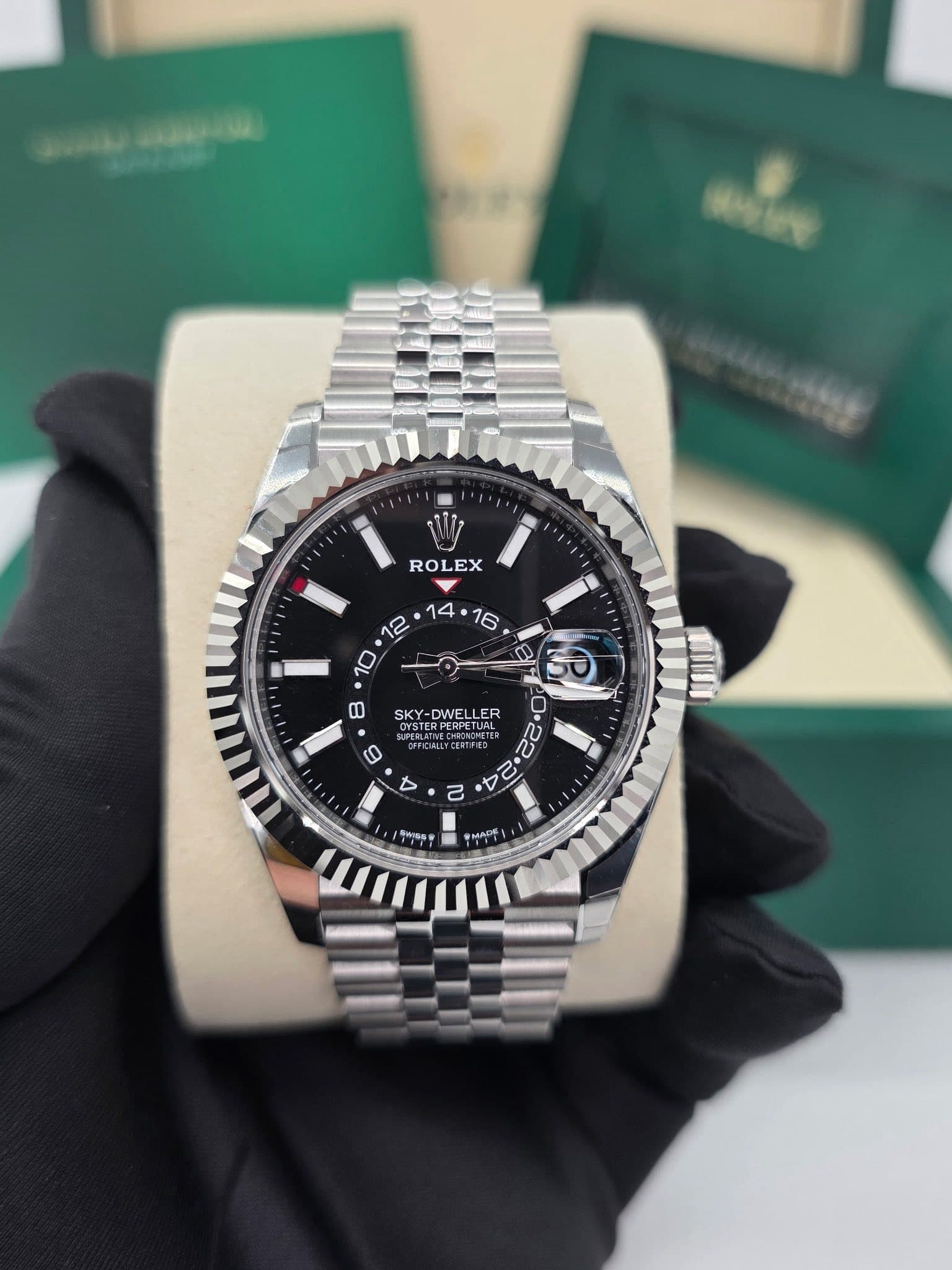 May be an image of wrist watch and text