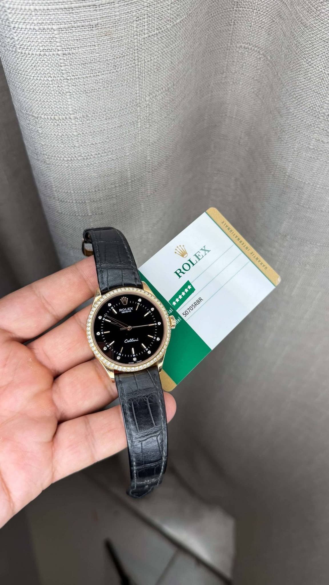 May be an image of wrist watch and text