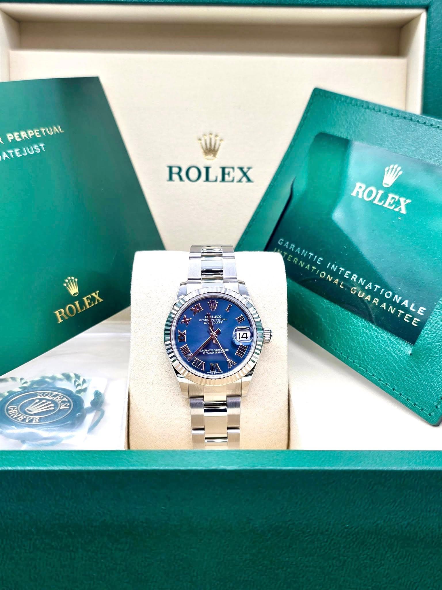 May be an image of wrist watch and text that says 'PERPETUAL ATEJUST ROLEX ROLEX ROLEX ROL ROLEX w 味酒 मर 년까 SNt wail TER JUST GARANTIE GARANTIE TERNATIONAL. ERNATIONA…